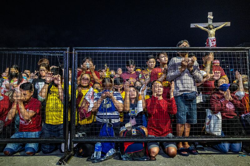 Roman Catholic devotees during the Feast of the Black Nazarene at Quirino Grandstand, Manila. Getty Images

