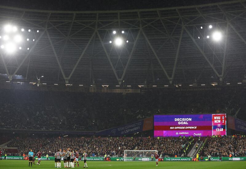 A big screen displays the VAR review after Joelinton's first goal was given. Reuters