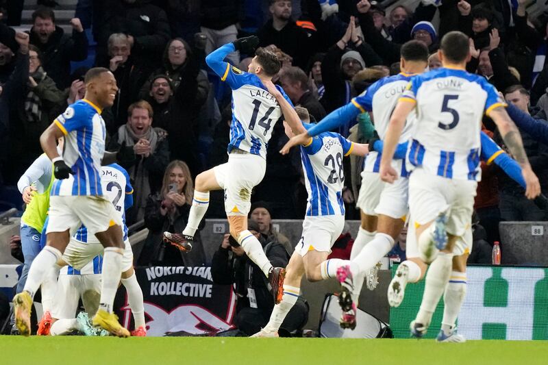 Brighton celebrate after Solly March scored the opening goal. AP
