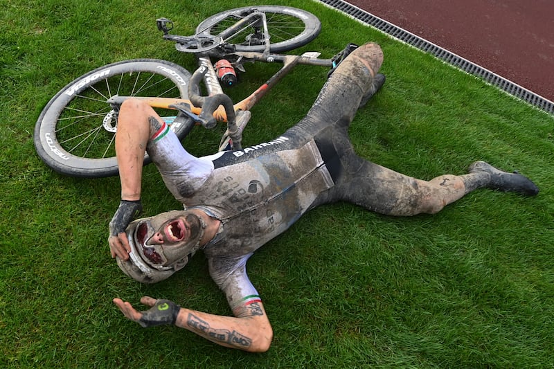 Italy's Sonny Colbrelli celebrates winning the Paris-Roubaix one-day-race cycling race on Sunday, October  3. AP