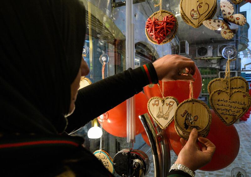 A woman shops for Valenine's day presents in a shopping mall in Iraq's northern city of Mosul. AFP