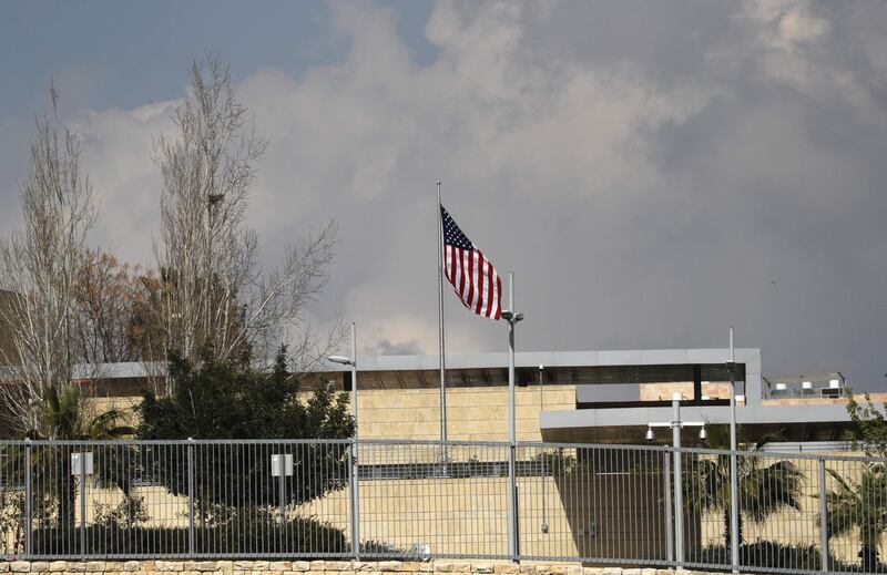 A picture taken on February 24, 2018, shows the US flag flying over the US consulate building complex in Jerusalem, which is considered one of the options to host the new US embassy headquarters after its relocation from Tel Aviv.  
The United States will move its embassy from Tel Aviv to Jerusalem in May 2018 to coincide with Israel's 70th Independence Day according to US officials. / AFP PHOTO / AHMAD GHARABLI