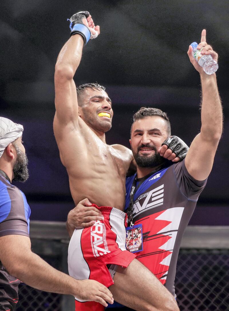 Abu Dhabi, United Arab Emirates, October 4, 2019.   --  Brave Combat Federation 27 at the Mubadala Arena.--
Bantamweight winner,  Zia Mashwani of Pakistan is carried by his coach after the fight.
Victor Besa / The National
Section:  SP
Reporter:  Amith Passela