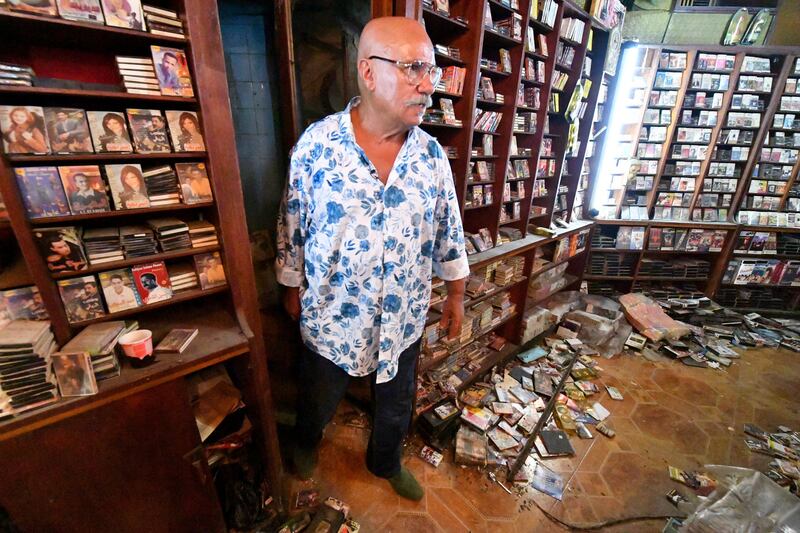 Inside the shop, barely touched in years, cassettes pile up on the shelves, surrounded by vintage audio equipment that could be in an antiques museum.