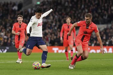 Tottenham Hotspur's Son Heung-min scores their side's third goal of the game during the Premier League match at Tottenham Hotspur Stadium, London. Picture date: Sunday December 5, 2021.