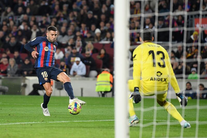 Jordi Alba shots to score Barcelona's first goal against Sevilla. AFP