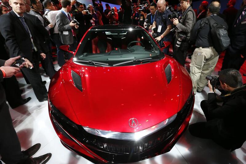 The 2016 Acura NSX supercar made its triumphant return after a decade, with the unveiling of the technologically advanced production car at the North American International Auto Show. Honda will start taking custom orders this summer for the two-seat sports car. Paul Sancya / AP Photo
