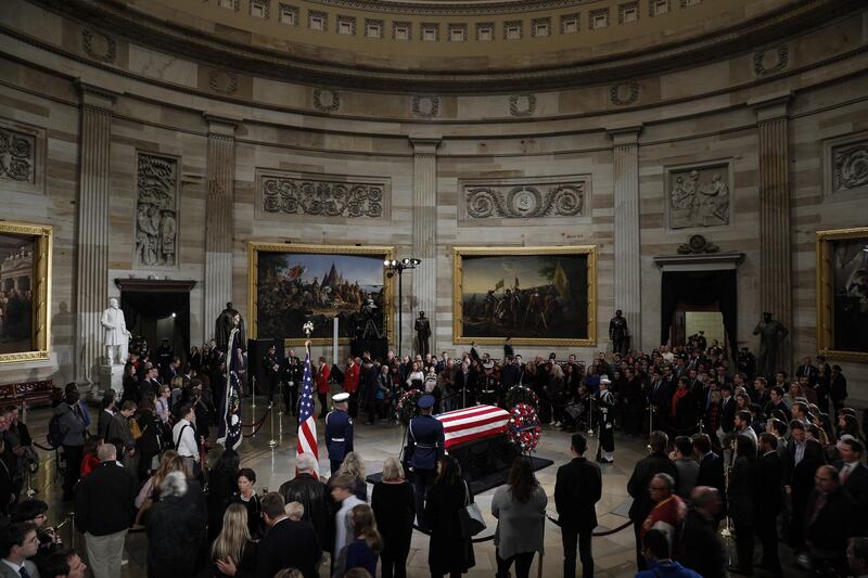 Members of the public pay their respects. The body will lie in state in the Capitol before being moved to the Washington National Cathedral for a funeral service. Bloomberg