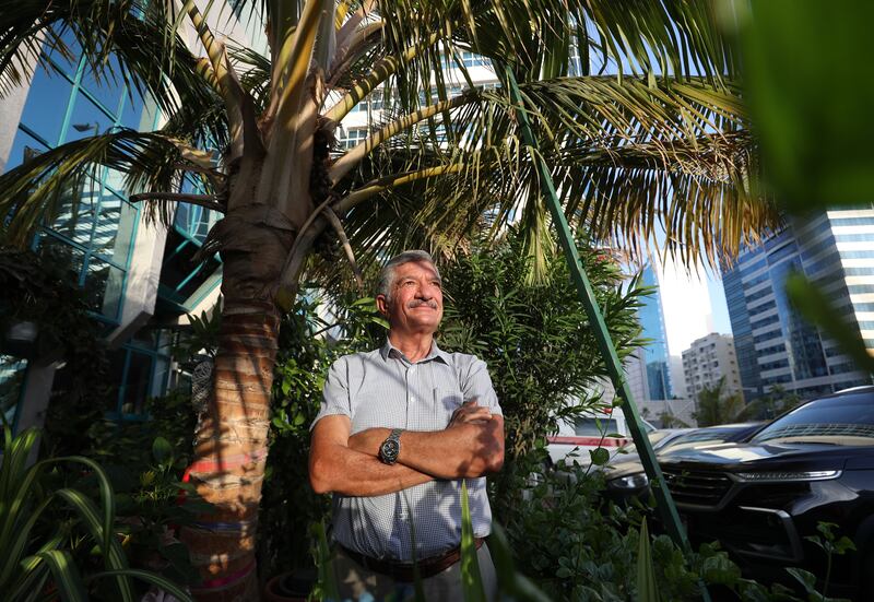Sinan Al Awsi, 62, who has lived in the Emirates since 1999, has happily given up his time to greenify Sheikh Rashid bin Saeed Street over the past seven years. All photos: Chris Whiteoak / The National