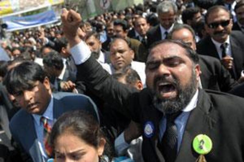 Pakistani lawyers march during a protest in Rawalpindi on March 13 2009.