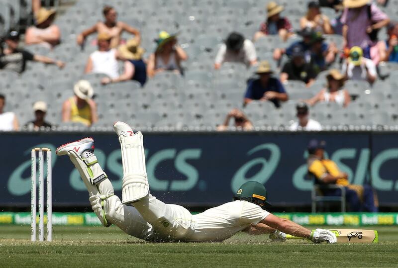 Tim Paine of Australia dives after taking a quick single during day three of the Boxing Day Test match between Australia and India at the Melbourne Cricket Ground (MCG) in Melbourne, Australia, 28 December 2018.  EPA