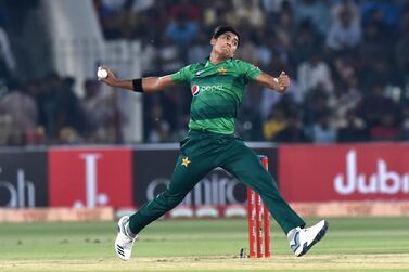 Pakistan's cricketer Mohammad Hasnain delivers a ball during the first Twenty20 International cricket match between Pakistan and Sri Lanka at the Gaddafi stadium in Lahore on October 5, 2019.  Sri Lanka, boosted by a career-best half century from opener Danushka Gunathilaka, posted 165-5 against Pakistan in the first Twenty20 international in Lahore. / AFP / ARIF ALI