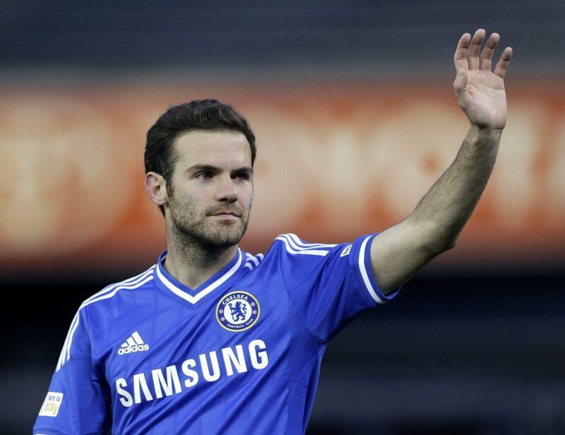 Juan Mata officially joined Manchester United on Saturday. Julio Cortez / AP