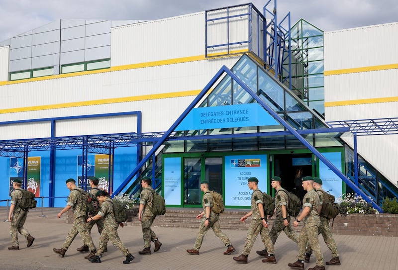 Lithuanian soldiers arriving at the summit venue. Bloomberg