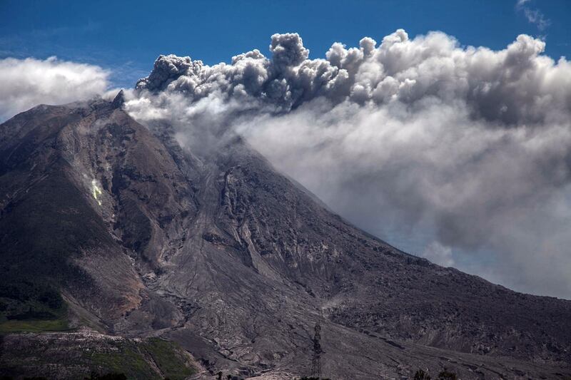 Mount Sinabung volcano spews thick volcanic ash, as seen from Karo, Indonesia. Sinabung roared back to life in 2010 for the first time in 400 years, after another period of inactivity it erupted once more in 2013, and has remained highly active since.Ivan Damanik / AFP