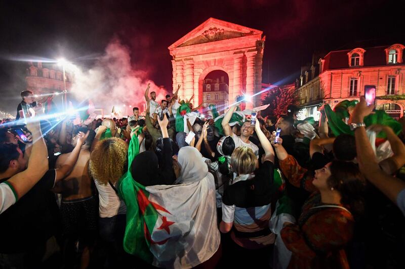 Algerian supporters celebrate on Place de la Victoire square in Bordeaux, southwestern France, after Algeria won the 2019 Africa Cup of Nations final. AFP