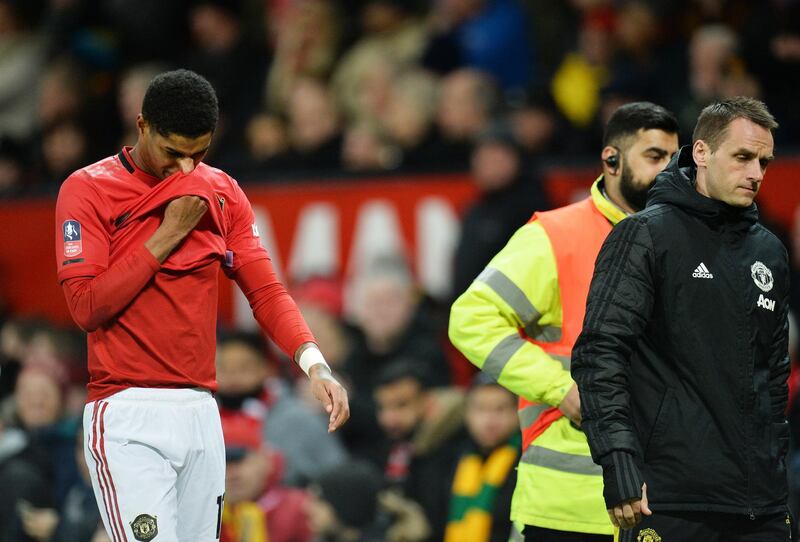 Marcus Rashford of Manchester United walks off injured against Norwich City. EPA