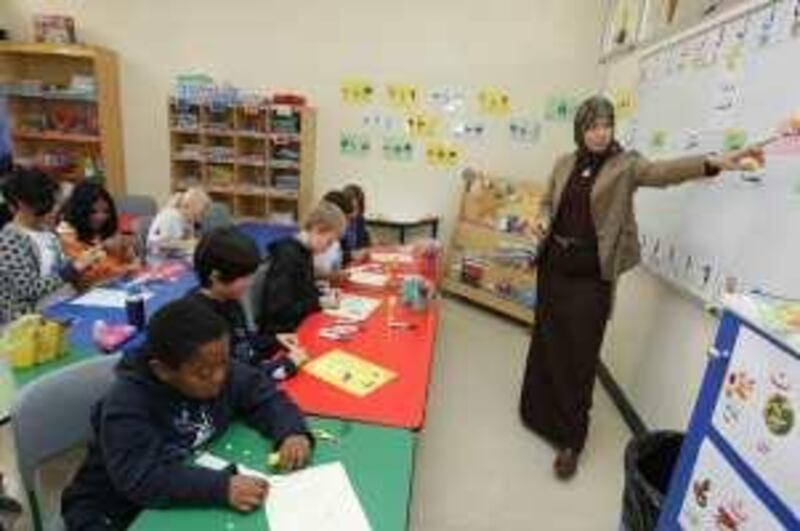 United Arab Emirates - Abu Dhabi - Jan 12 - 2010 : Teacher Nisrin El Friji, from Lebanon, with students during an arabic class at GEMS American Academy. ( Jaime Puebla / The National ) *** Local Caption ***  JP Arabic Classes 03.jpg