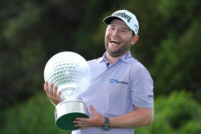 SUN CITY, SOUTH AFRICA - NOVEMBER 12:  Branden Grace of South Africa poses with the trophy after his victory during the final round of the Nedbank Golf Challenge at Gary Player CC on November 12, 2017 in Sun City, South Africa.  (Photo by Richard Heathcote/Getty Images)