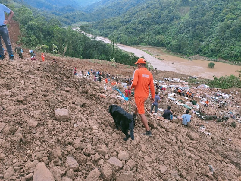 A member of India's National Disaster Response Force at the landslide in Noney district, Manipur state. EPA