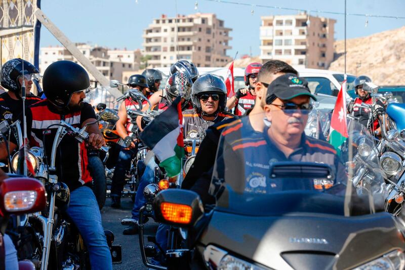 Motorcyclists from Syria, Lebanon, and Jordan take part in a ride to encourage tourism through the town of Saidnaya, north of Syria's capital Damascus.  AFP