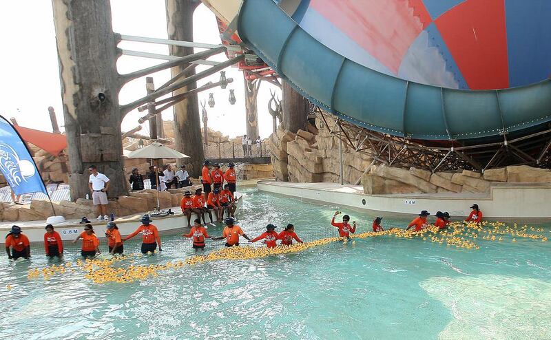 More than 2,000 thousand rubber ducks race for charity raising over Dh60,000 for the Make-A-Wish UAE Foundation at Yas Waterworld in Abu Dhabi. Ravindranath K / The National