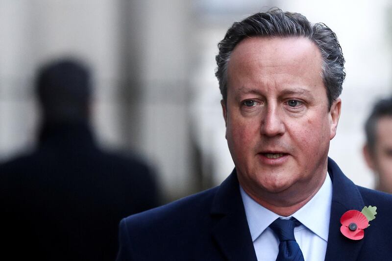 FILE PHOTO: Britain's former Prime Minister David Cameron arrives to attend the National Service of Remembrance, on Remembrance Sunday, at The Cenotaph in Westminster, London, Britain, November 10, 2019. REUTERS/Simon Dawson/File Photo