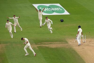 LONDON, ENGLAND - SEPTEMBER 11:  James Anderson of England celebrates after bowling Mohammed Shami of India to become the leading fast bowler in Test history during the Specsavers 5th Test - Day Five between England and India at The Kia Oval on September 11, 2018 in London, England.  (Photo by Mike Hewitt/Getty Images)