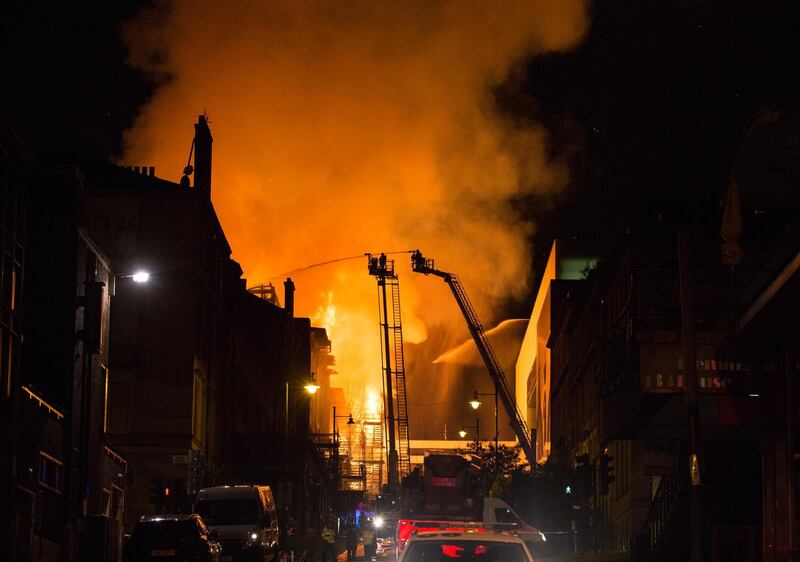 GLASGOW, SCOTLAND - JUNE 16:   The Mackintosh Building at the Glasgow School Of Art is ablaze for the second time in four years on June 16, 2018 in Glasgow, Scotland. In May 2014 it was devastated by a huge fire leading to a multi-million pound restoration due to complete in 2019. It was built in the late 1890's by Charles Rennie Mackintosh, then a junior draughtsman, and is widely considered to be his masterpiece. (Photo by Robert Perry/Getty Images)
