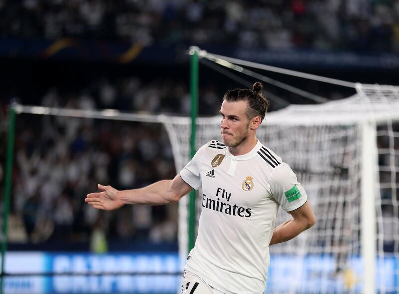 Abu Dhabi, United Arab Emirates - December 19, 2018: Gareth Bale of Real Madrid scores during the game between Real Madrid and Kashima Antlers in the Fifa Club World Cup semi final. Wednesday the 19th of December 2018 at the Zayed Sports City Stadium, Abu Dhabi. Chris Whiteoak / The National