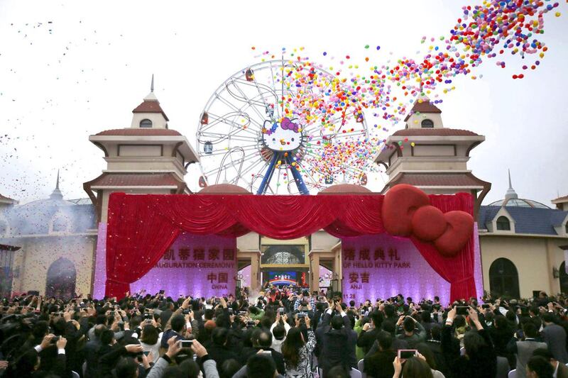 Guests attend the inauguration ceremony of first Hello Kitty amusement park outside Japan. Carlos Barria / Reuters