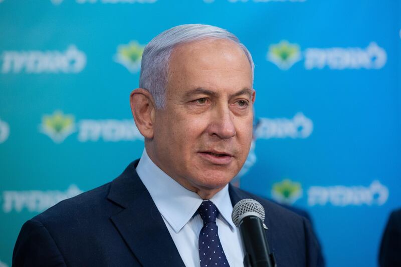 epa09016576 Israeli Prime Minister Benjamin Netanyahu speaks during his visit to the Leumit Health Care Services vaccination facility in Jerusalem, 16 February 2021. Netanyahu said Israel had allegedly vaccinated four million people against COVID-19.  EPA/ALEX KOLOMOISKY / POOL