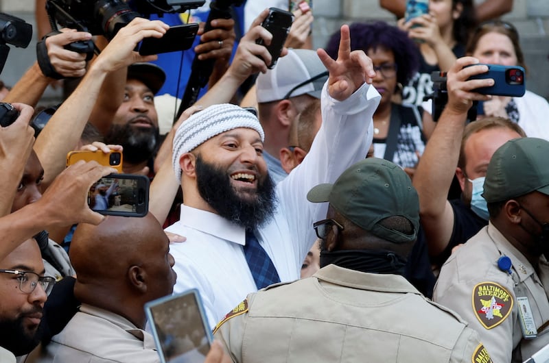 Adnan Syed smiles and waves as he leaves the courthouse after a judge overturned his 2000 murder conviction and ordered a new trial in Baltimore, Maryland. Reuters