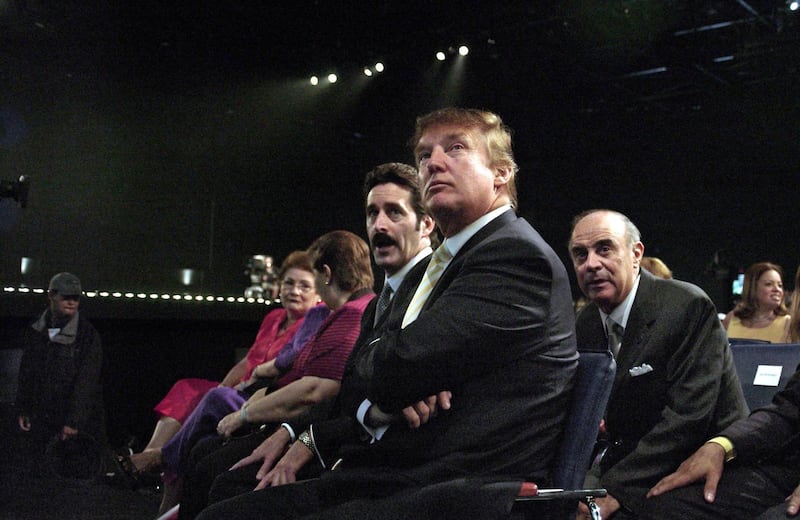 This photo from the Miss Universe organization shows Miss Universe owner Donald Trump watching the dress rehearsal for the 2003 Miss Universe competition 03 June, 2003, in Panama City. The final competition is taking place 03 June. AFP PHOTO/HO (Photo by NICK SANTOS / MISS UNIVERSE L.P., LLLP / AFP)