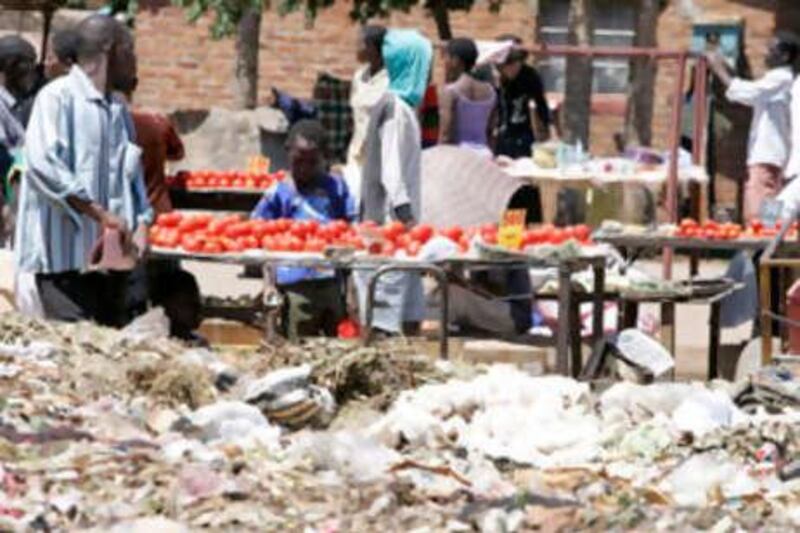 At a vegetable market in Harare, there is almost as much rubbish as there is produce.