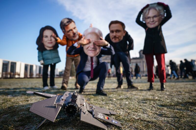 Activists protest in front of the Reichstag in Berlin, Germany, against the acquisition of F-35 fighter jets by the German government. EPA