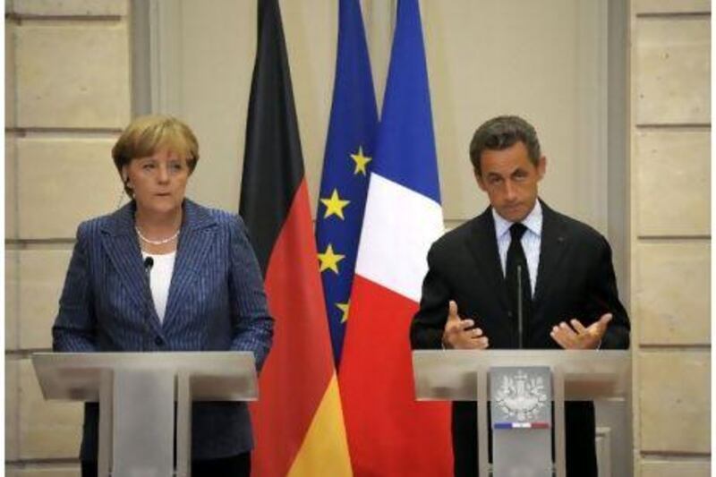 Stocks dropped ahead of talks between the French president Nicolas Sarkozy and the German chancellor Angela Merkel in Paris. EPA