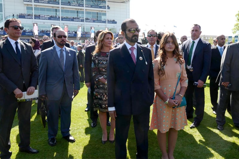 Sheikh Mohammed bin Rashid, Vice President and Ruler of Dubai, watches the 2000 Guineas Stakes, the first Classic horse race of the British racing season, at Newmarket. Also pictured: Princess Haya of Jordan, wife of Sheikh Mohammed bin Rashid, and their daughter Sheikha Al Jalila bint Mohammed. Wam