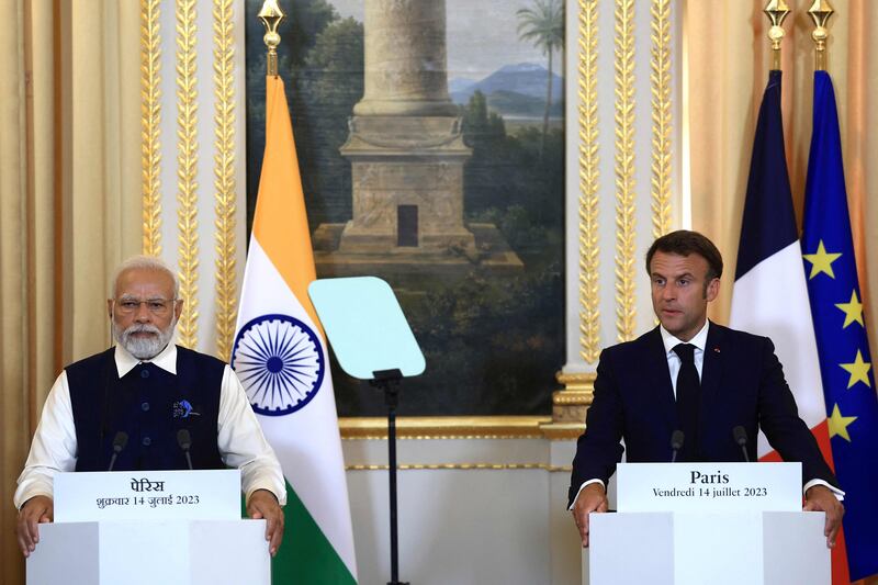 France's President Emmanuel Macron, right, and India's Prime Minister Narendra Modi issue a joint declaration following a meeting at the Elysee Palace in Paris. AFP