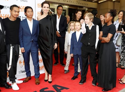 FILE PHOTO:  Director Angelina Jolie arrives on the red carpet with her six children (L-R) Maddox Jolie-Pitt, Pax Jolie-Pitt, Vivienne Jolie-Pitt, Knox Leon Jolie-Pitt, Shiloh Jolie-Pitt, and Zahara Jolie-Pitt for the film "First They Killed My Father" at the Toronto International Film Festival (TIFF), in Toronto, Ontario, Canada, September 11, 2017.    REUTERS/Mark Blinch/File Photo