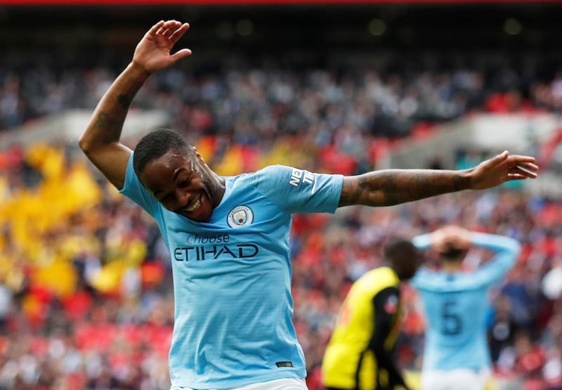 Manchester City's Raheem Sterling celebrates his second goal and City's fifth against Watford. Reuters