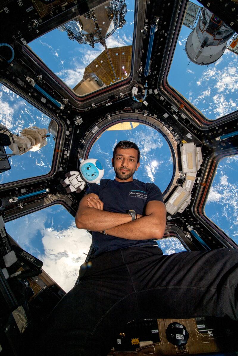 Dr Al Neyadi and Suhail - the MBRSC mascot - in front of the cupola on the International Space Station on March 17, 2023.