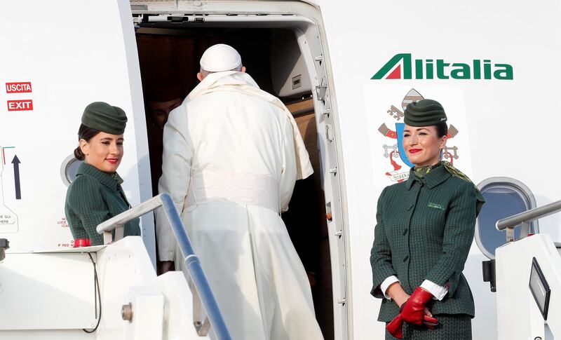 Pope Francis boards a plane for a two day visit to Ireland at the Leonardo da Vinci-Fiumicino Airport in Rome, Italy. Reuters