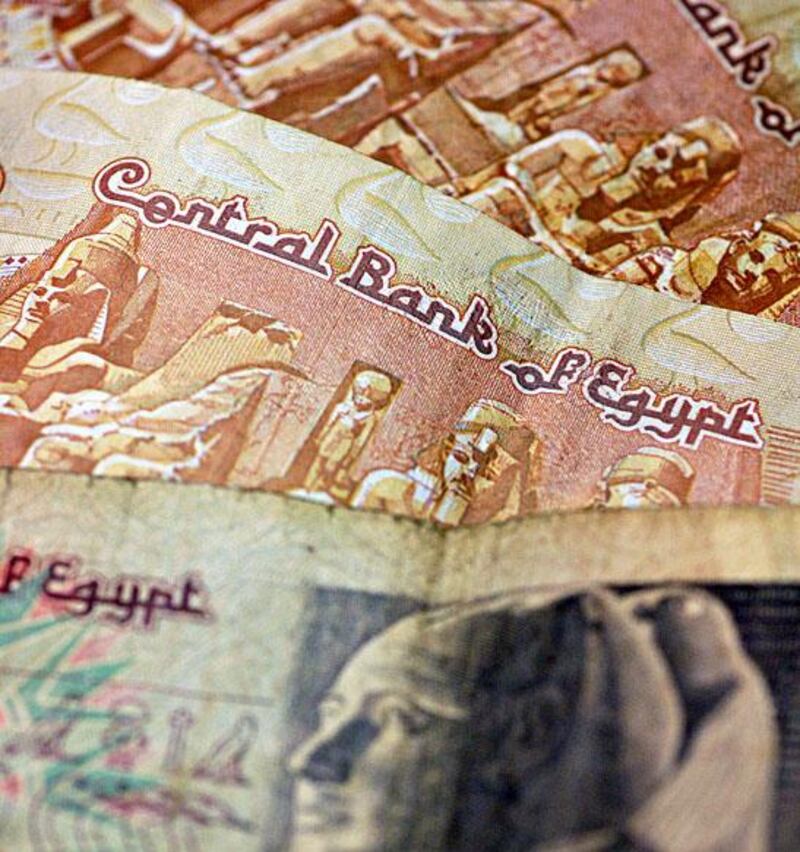 The Egyptian currency was devalued to 8.85 pounds from the official rate of 7.73 pounds. Daniel Acker / Bloomberg News