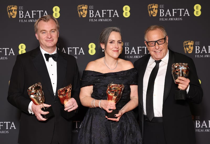 Christopher Nolan, Emma Thomas and Charles Roven after winning the Bafta Best Director and Best Film awards for 'Oppenheimer'. EPA