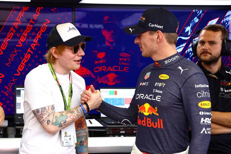 Ed Sheeran meets Formula One world champion Max Verstappen in the Red Bull Racing  garage prior to the F1 Grand Prix of USA at Circuit of The Americas. AFP