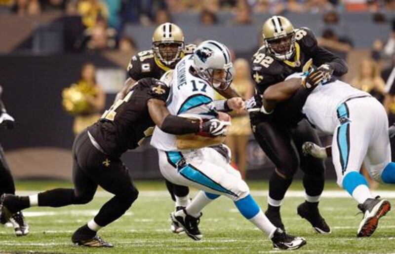 The Carolina Panthers quarterback Jake Delhomme, No 17, is sacked by Roman Harper, No 41, of the New Orleans Saints at Louisiana Superdome on Sunday night. The Saints staged a remarkable comeback to win, marking their best start to a season.