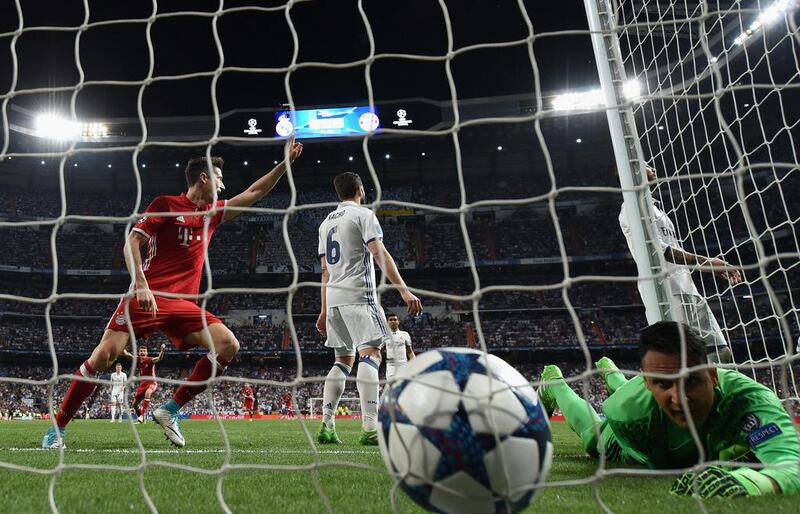Sergio Ramos of Real Madrid (obscure) scores an own goal.  Matthias Hangst / Getty Images