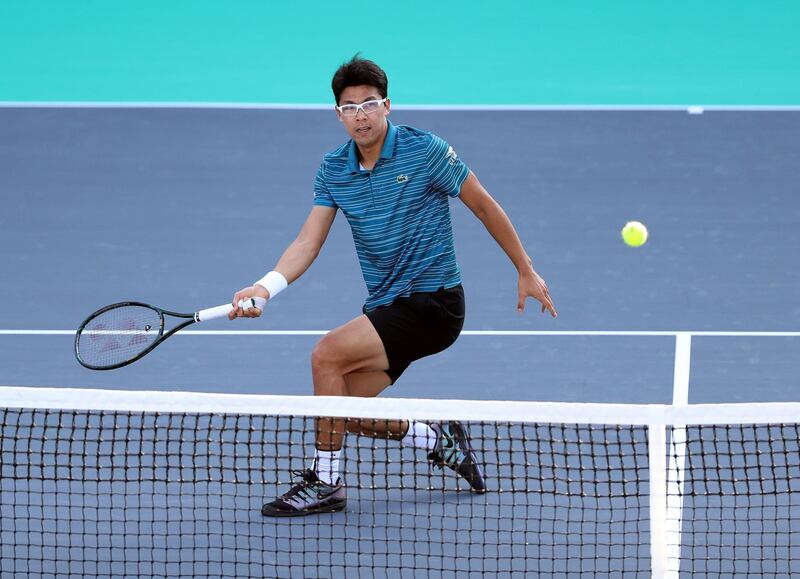 Abu Dhabi, United Arab Emirates - Reporter: Jon Turner: Hyeon Chung hits a shot during the fifth place play-off between Andrey Rublev v Hyeon Chung at the Mubadala World Tennis Championship. Friday, December 20th, 2019. Zayed Sports City, Abu Dhabi. Chris Whiteoak / The National