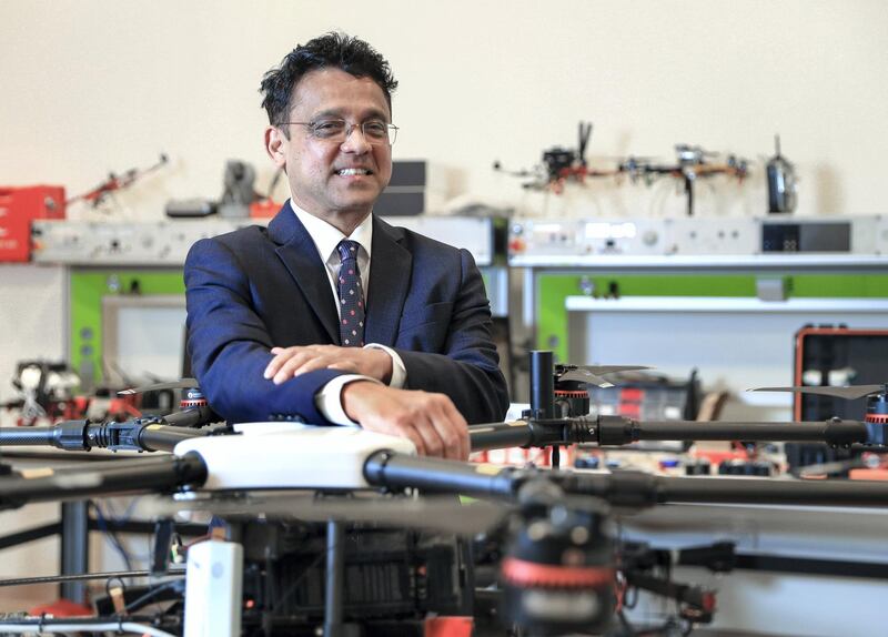 Abu Dhabi, U.A.E., January 24, 2019.  
Khalifa University, Abu Dhabi.  Robotics Pofessor, Lakmal Seneviratne with his drone with a fire extinguisher attachment.
Victor Besa / The National
Section:  NA
Reporter:  Dan Sanderson